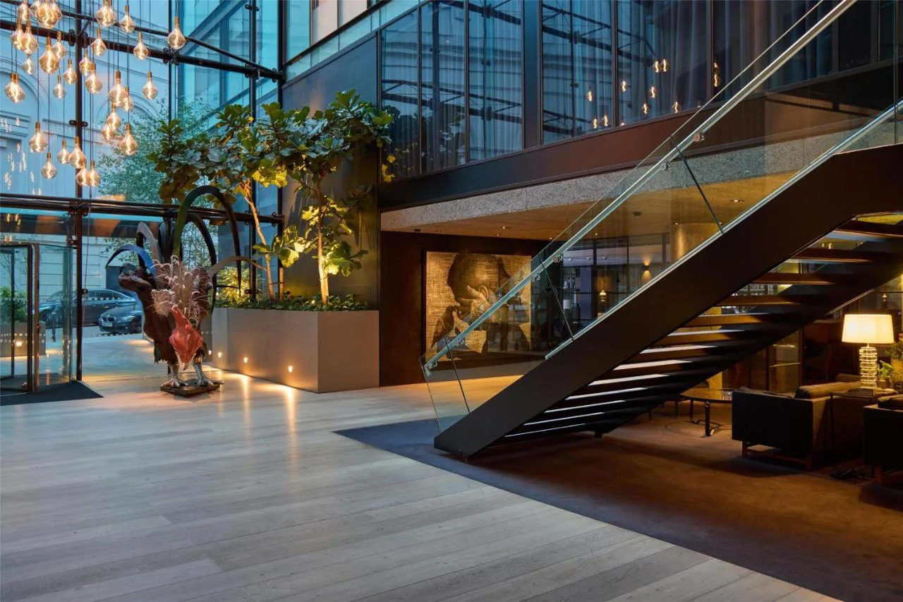 Lobby staircase inside The Edwardian Manchester, A Radisson Collection Hotel